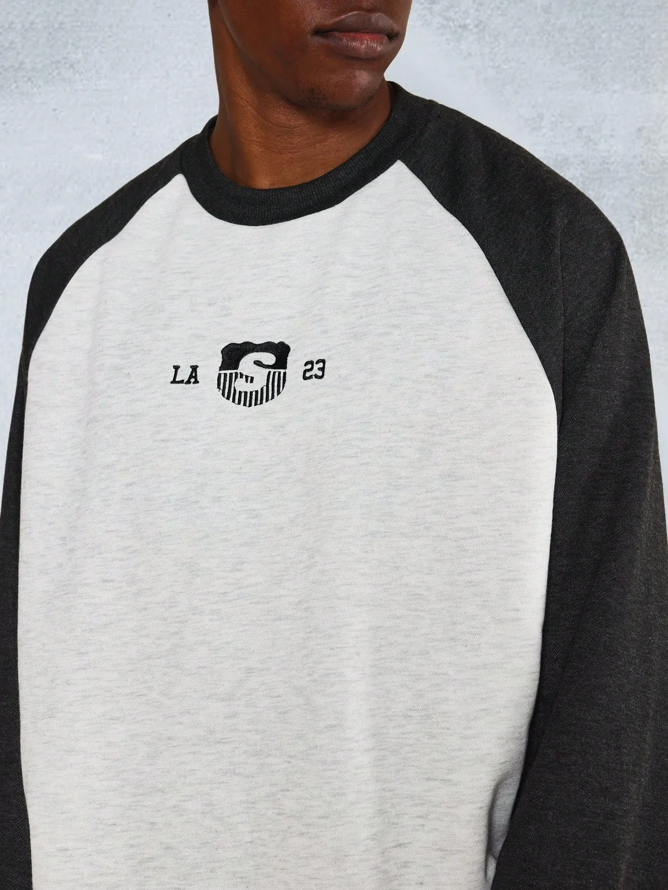 Crop Fit Raglan Raw Edge Sweatshirt With Front Embroidery