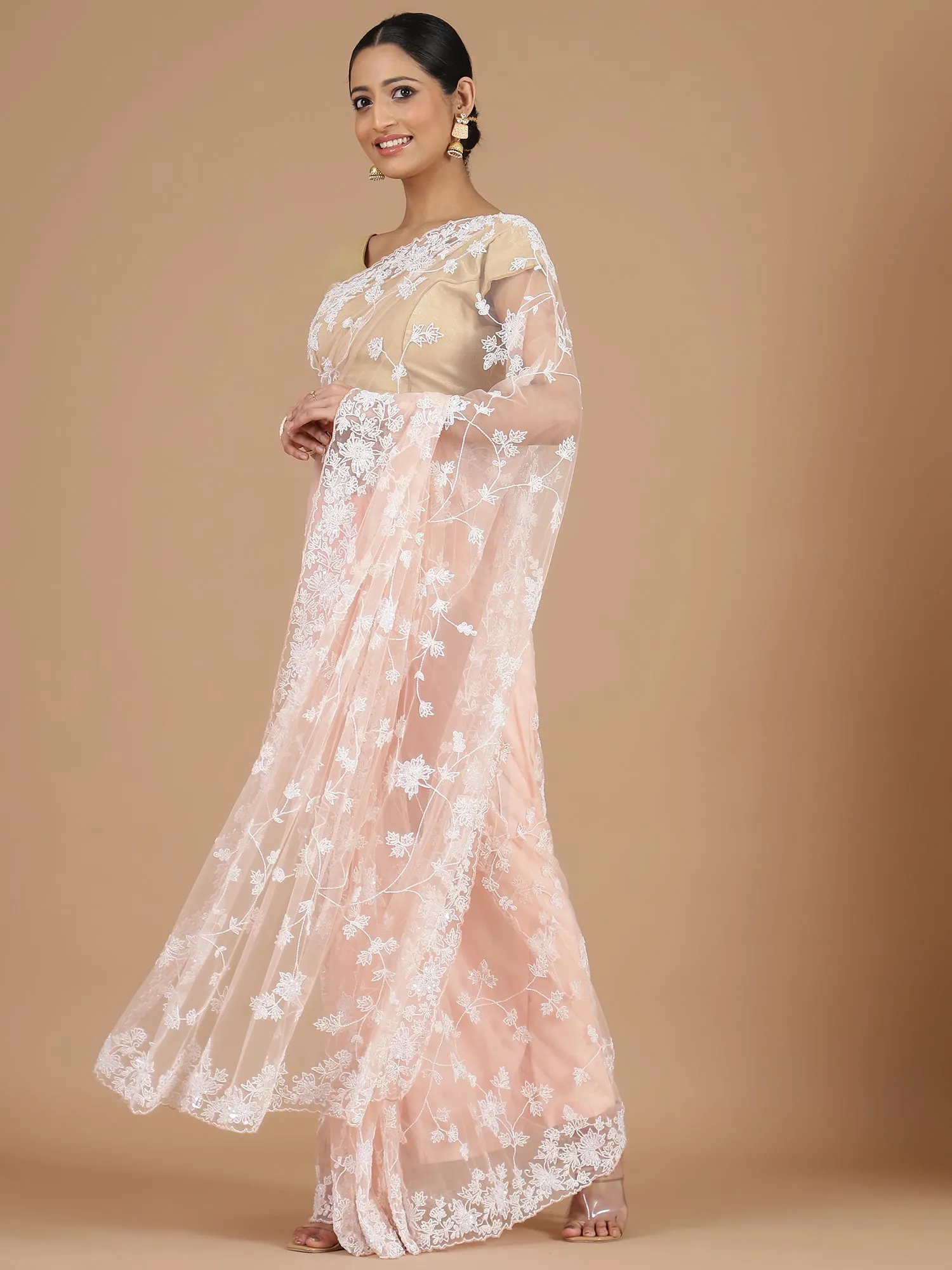 Peach Netted Saree with Elegant Pearl Work